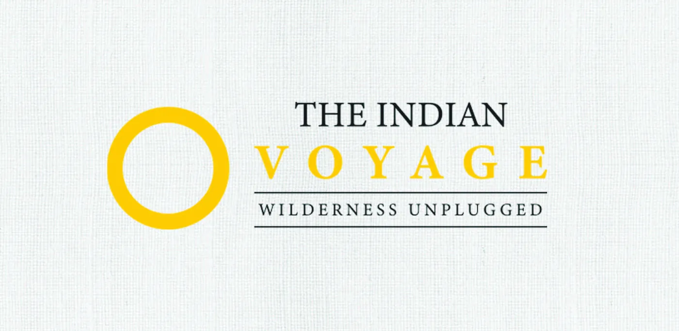 The Indian Voyage logo, a yellow ring beside a serif wordmark and “Wilderness unplugged”